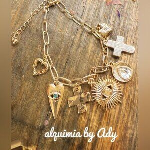 Charms adorned gold bracelet